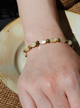 海螺贝米粒*檀木珠手串猫眼手链