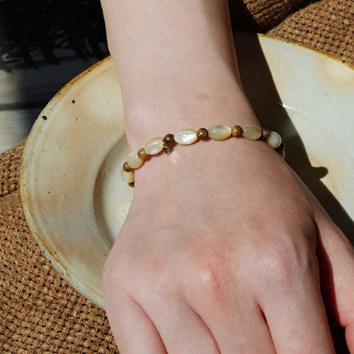 海螺贝米粒*檀木珠手串猫眼手链