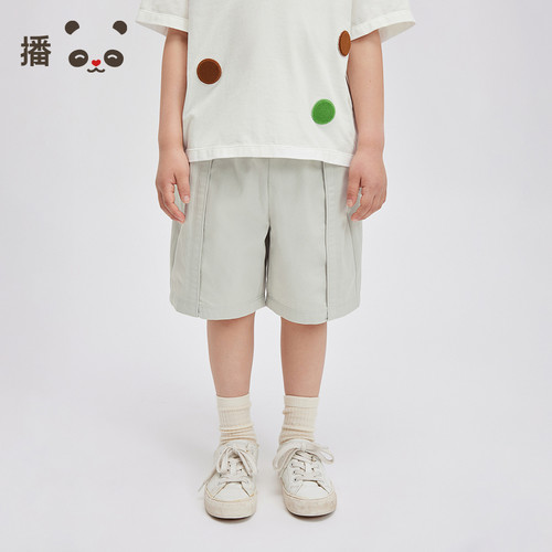松紧腰身，口袋装饰