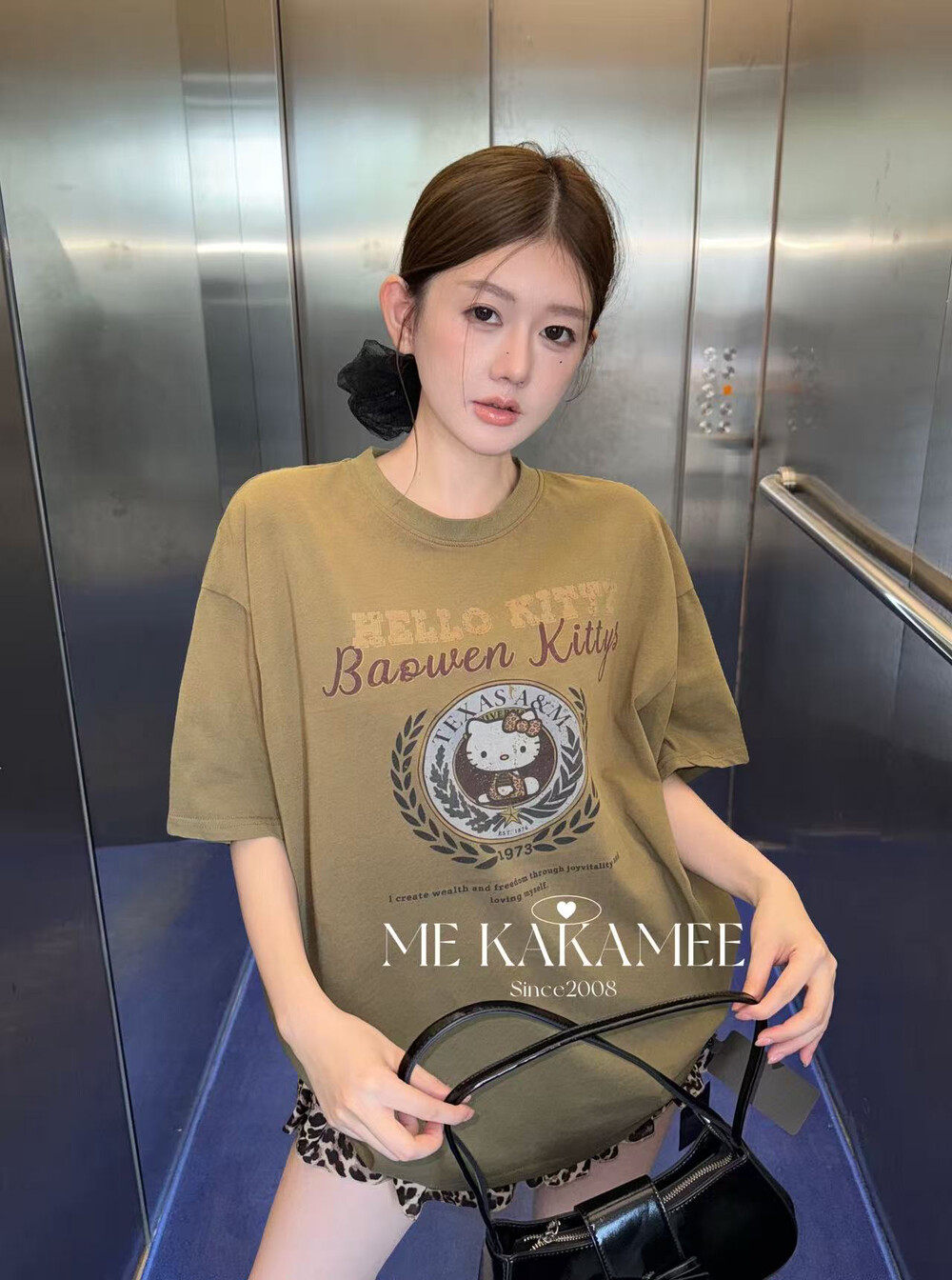 ME KAKAMEE夏新品洗水渐变工艺喷画KT猫宽松字母大版短袖T恤9337