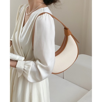 真皮包包小众设计通勤女包感法式腋下包2025新款布纹皮月牙包