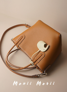 怪兽君2025新款高级感包包趣闻水桶包头层牛皮手提包真皮斜挎包女