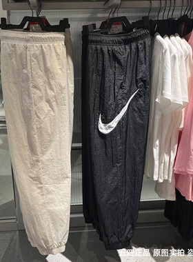 正品Nike/耐克女子运动大勾logo休闲松紧梭织束脚长裤DM6184-104