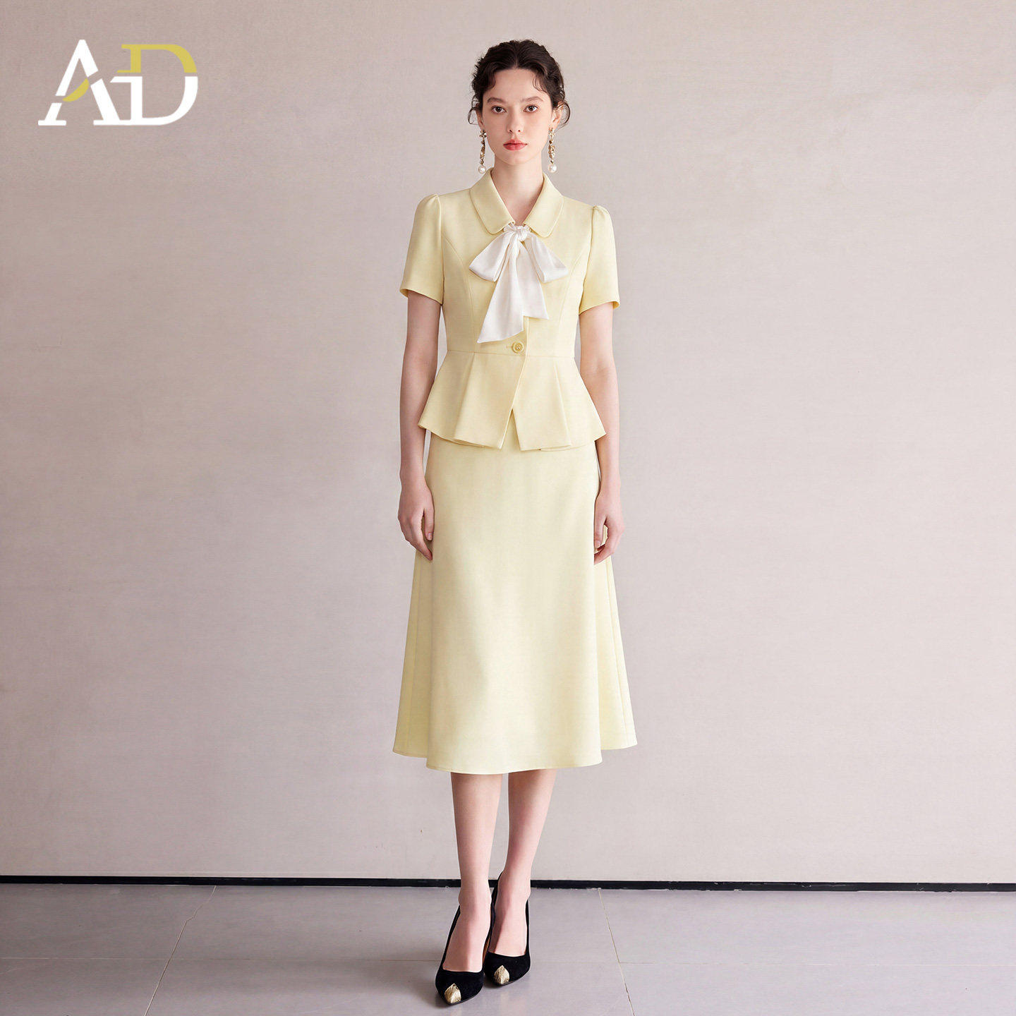 AD鹅黄色职业套装女夏新款温柔风通勤蝴蝶结短上衣A字半裙两件套