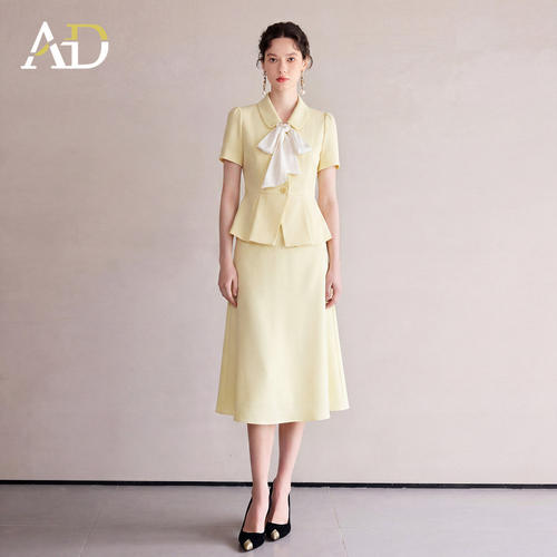 AD鹅黄通勤A字半裙套装
