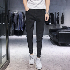 Pure black jeans men's slim little foot stretch pants Korean popular casual pants