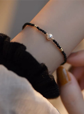 极细黑尖晶设计款水晶石强光淡水珍珠黑蝶贝猫咪银手链