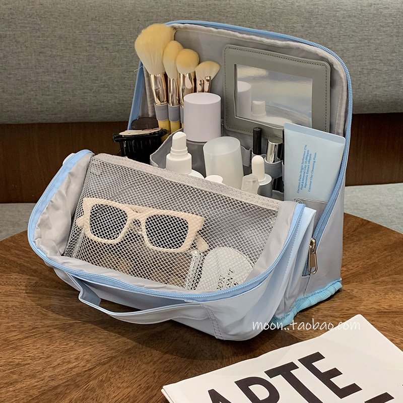 蓝色可立升级化妆包2026新款便捷式分区旅行收纳包挂行李箱大容量