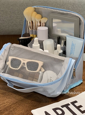 蓝色可立升级化妆包2026新款便捷式分区旅行收纳包挂行李箱大容量