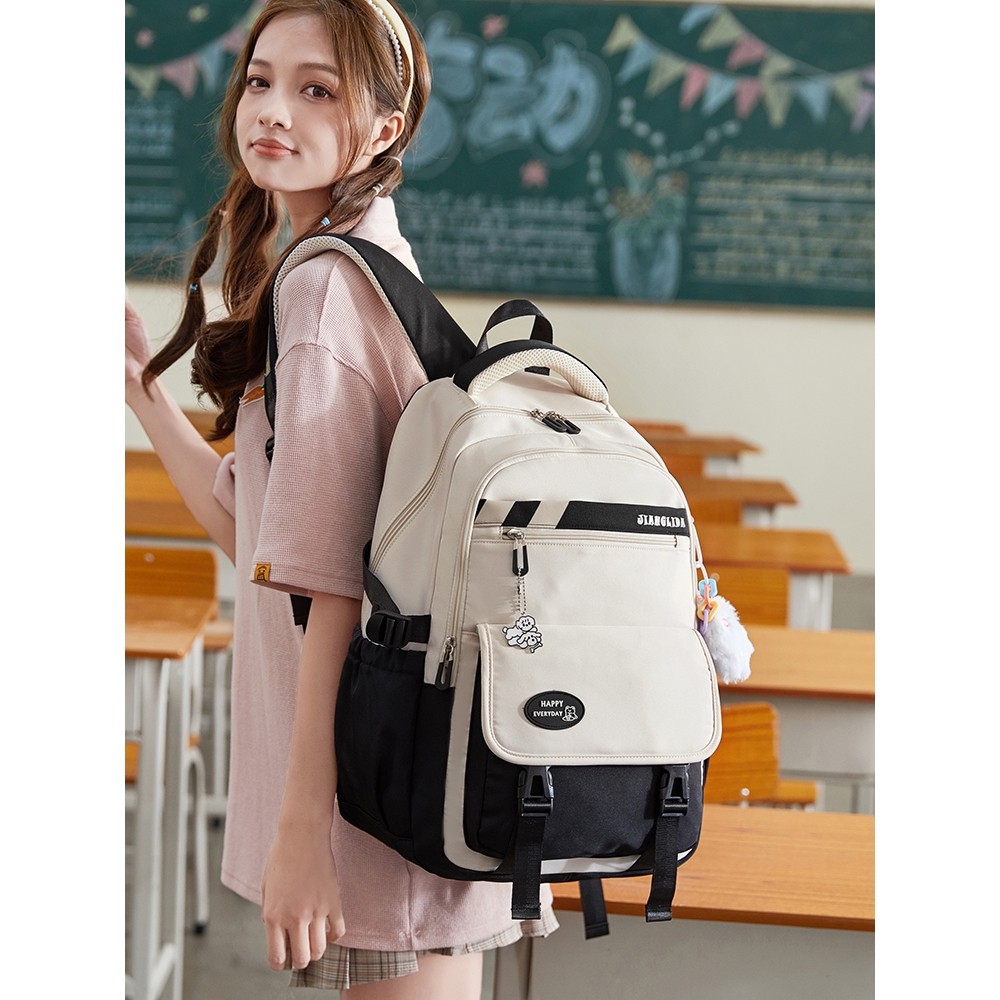 减负护脊超大容量中学生初中生书包女高中生女生小学生双肩背包潮