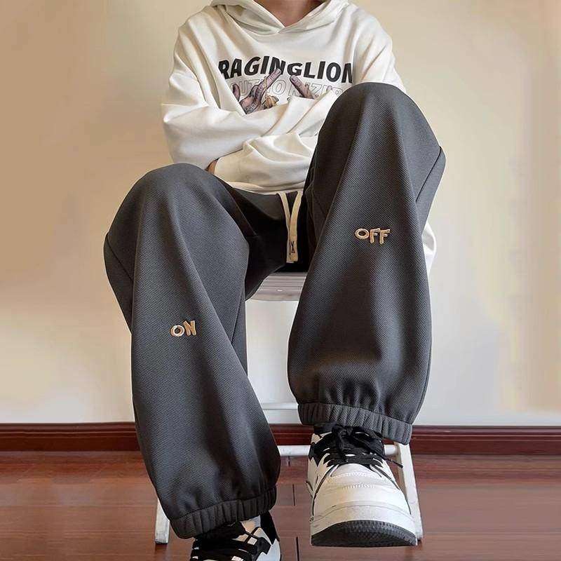 仓树一石潮牌刺绣加绒卫裤男秋冬季加厚束脚裤高街痞帅运动休闲裤