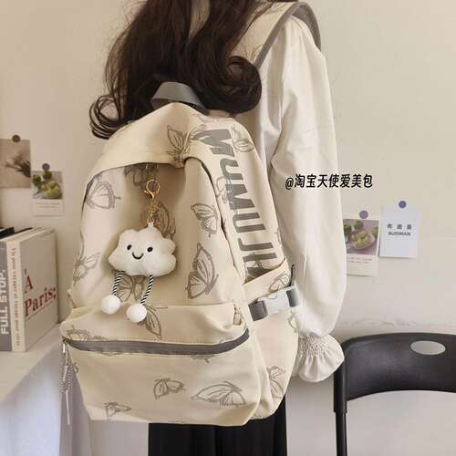 日本进口书包女生初中学生减负背包女大容量护脊蝴蝶学生双肩包