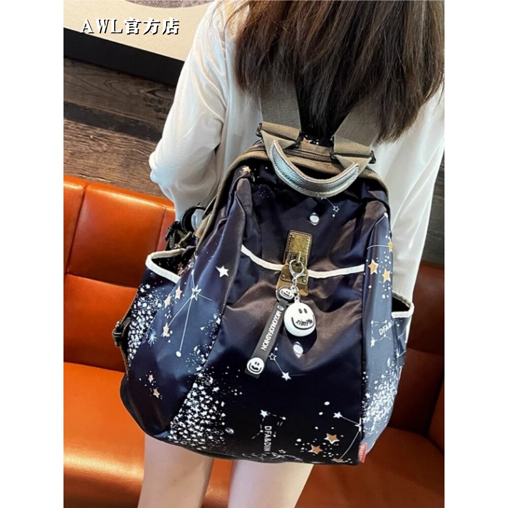 法国官方正品AWL 新款璀璨星空旅行双肩包大容量笑脸旅游背包书包