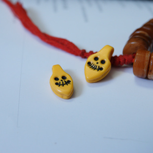 密胺文玩设计尸陀林黄色料器卡子侧挂骷髅配饰原生态DIY记数配件