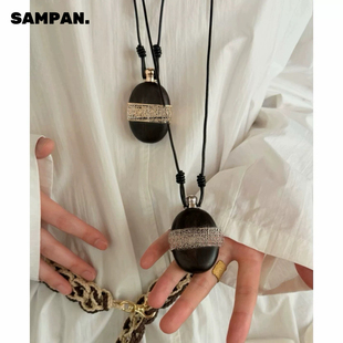 SAMPAN小众设计黑檀木酒壶项链女轻奢高级感黑皮绳毛衣链香水瓶