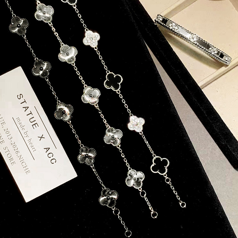 精工捡漏银色镭射五花四叶草玛瑙手链女小众熊猫黑白花朵手环手镯