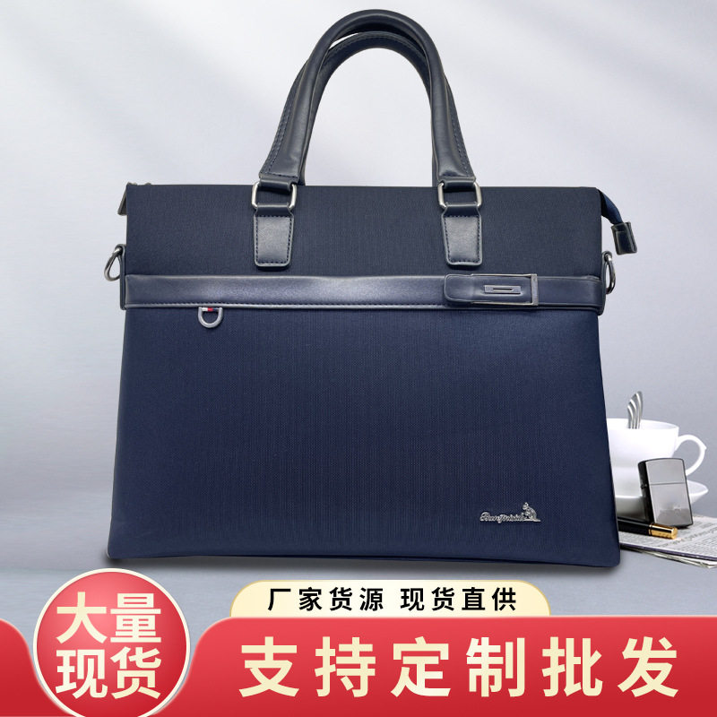 仅亏一天真皮新款手提包男士简约会议商务休闲笔记本电脑男包大容