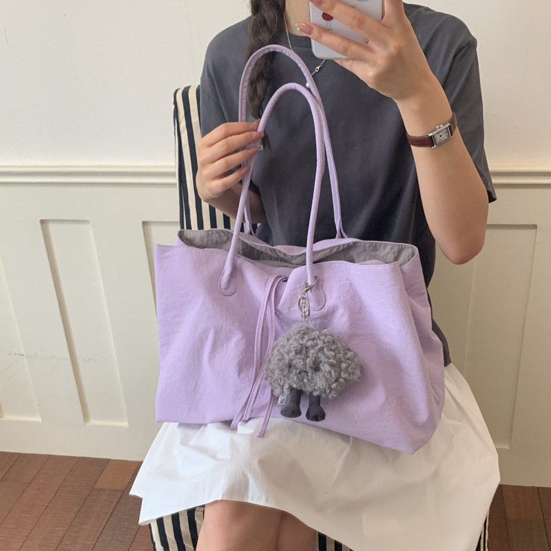 防水轻便尼龙手提包包女款2026新款大容量日常通勤百搭单肩托特包