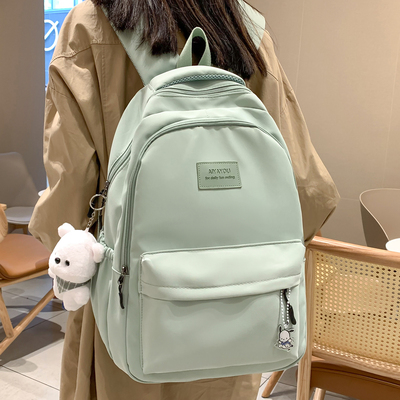 小学生双肩包女纯色书包
