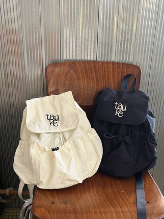 韩国ins博主同款小众设计抽绳翻盖双肩背包尼龙帆布包春夏旅行包