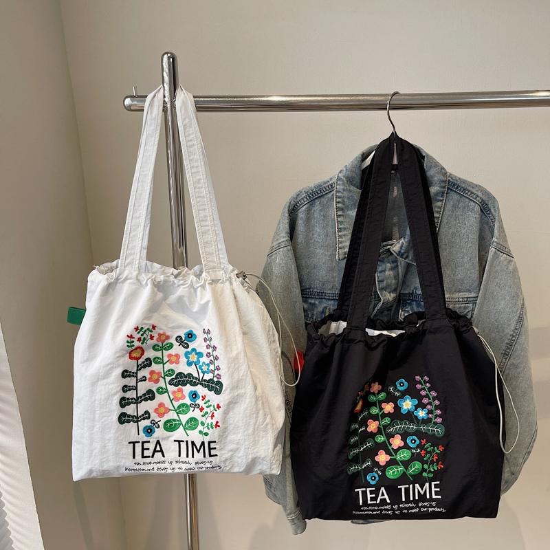 韩版ins卡通刺绣托特包包女式通勤大容量轻便尼龙布袋学生上课包
