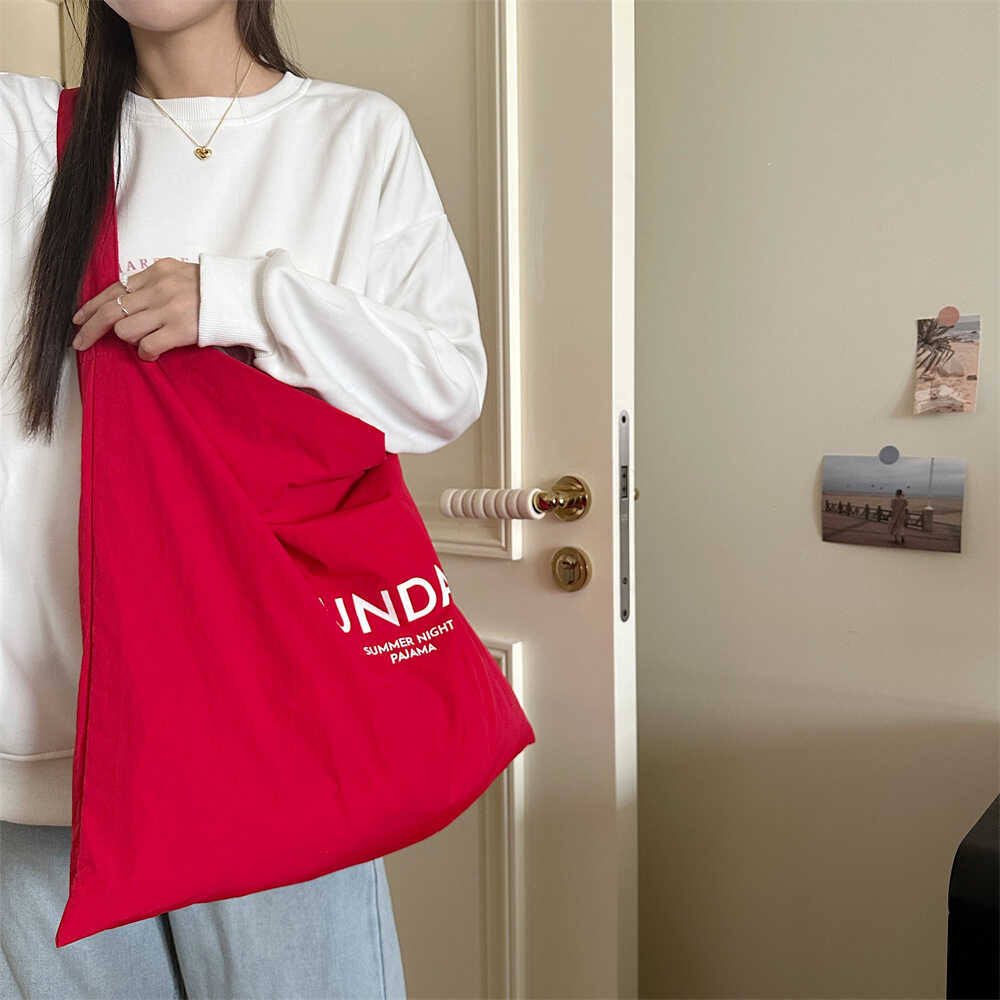 大容量包包女单肩字母印花尼龙小清新布袋手提简约百搭休闲购物袋