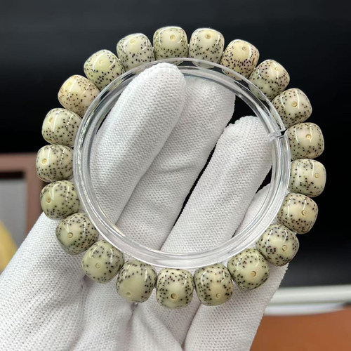 石玉骨瓷白11*10桶珠正月大留白