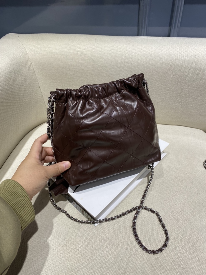 真皮女包水桶包手抓纹时尚