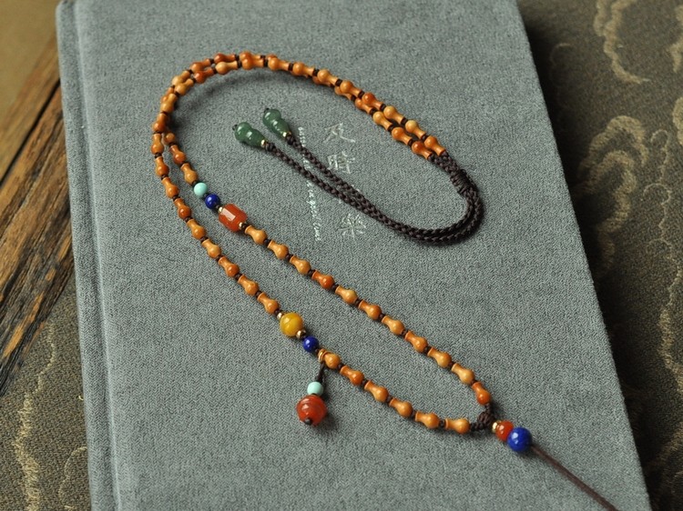 xl0218新款精品橄榄核宝瓶珠个性多宝不对称设计手工编织项链挂绳