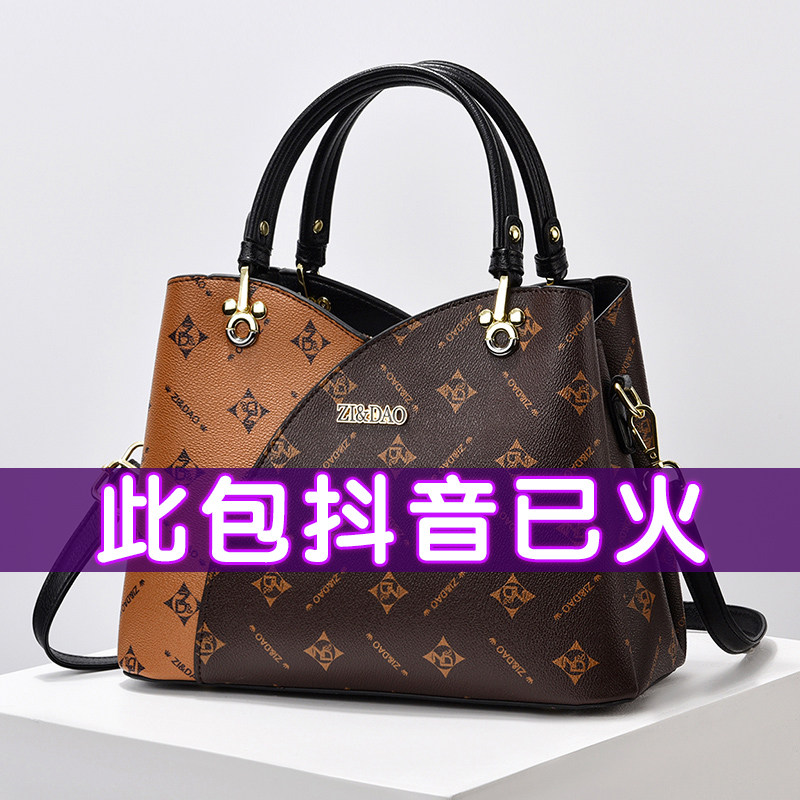 真皮质感手提包印花女包