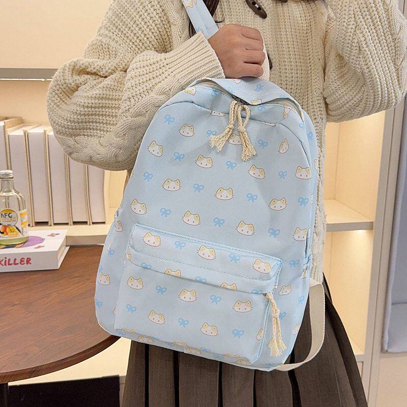 可爱卡通猫咪双肩背包女2026新款韩版学生书包小清新蓝色印花背包