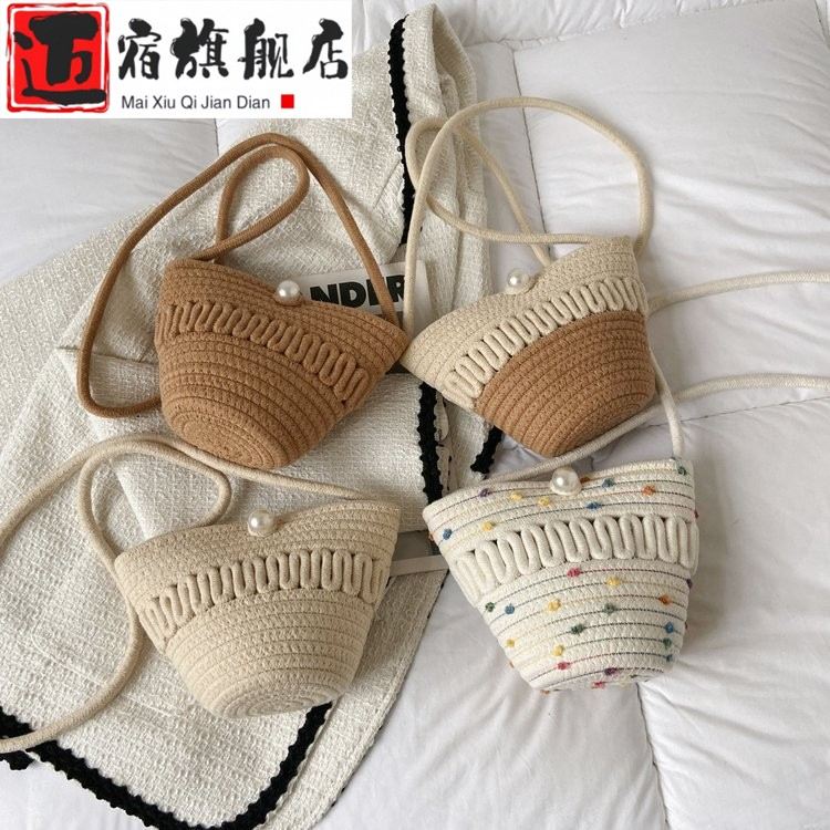 2025夏季新款女包编织时尚百搭手提斜挎单肩水桶沙滩褶皱云朵小包