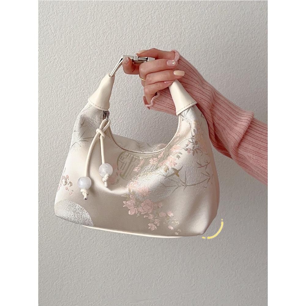 国风丝绸刺绣旗袍包包女2024新款秋冬斜挎饺子包古风新中式手提包