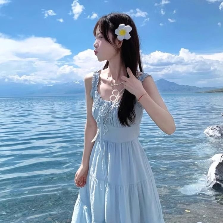 法式茶歇蓝色吊带连衣裙子女夏季2025新款温柔早春装气质修身长裙