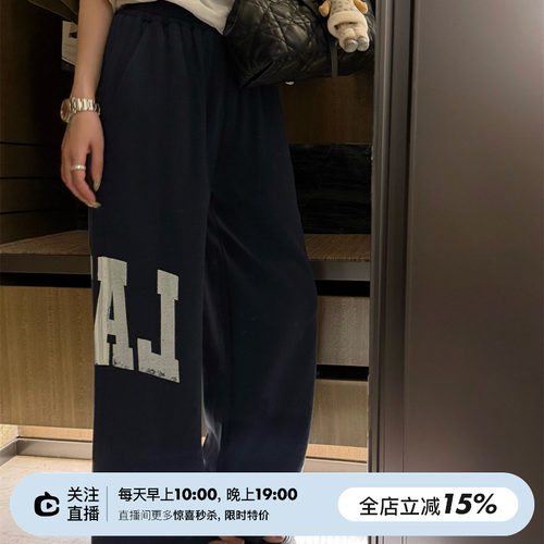 松紧腰裤脚剪裁两色卫裤