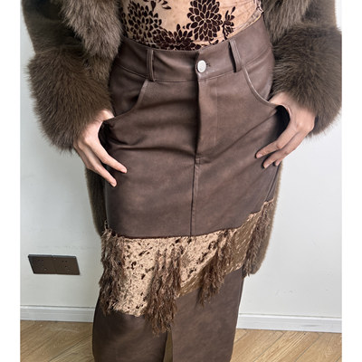 流苏棕色金丝绒拼接PU秋冬半身裙