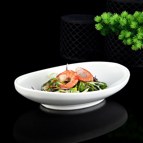 纯白色陶瓷带脚椭圆形菜盘子
