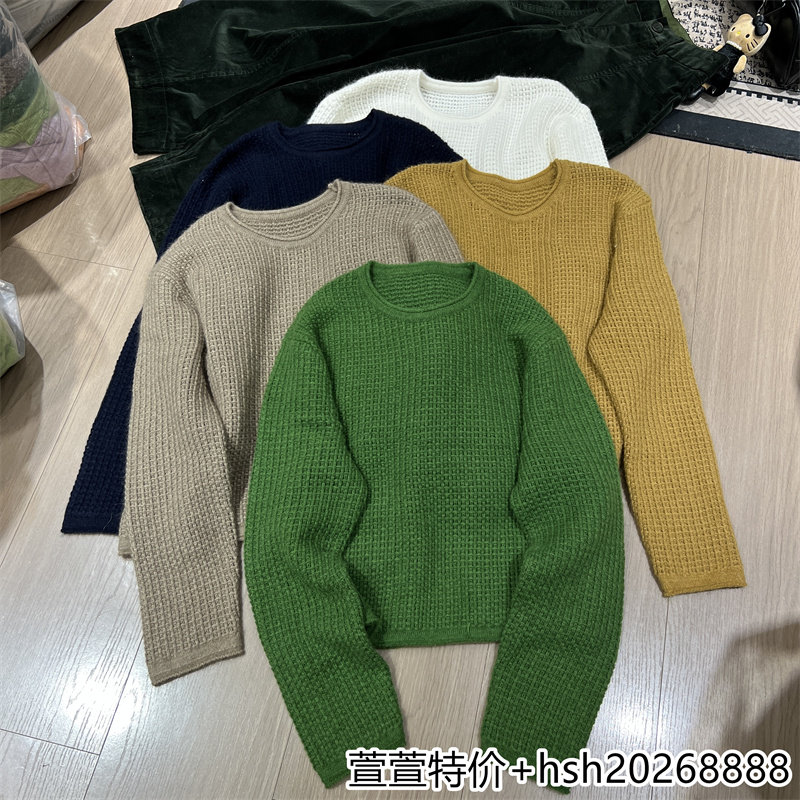 欧洲站2026秋冬新款休闲百搭卷边圆领宽松显瘦简约柔软针织毛衣女