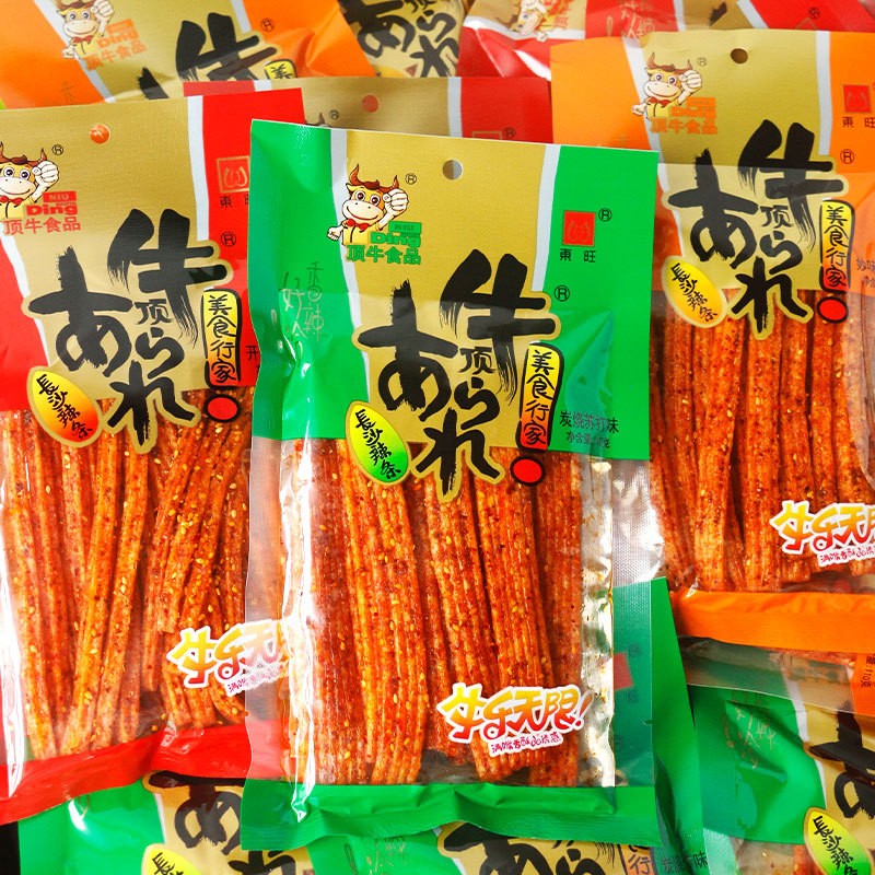 新日期东旺食品开心曲奇味辣条炭烧苏打味面筋制品110g麻辣