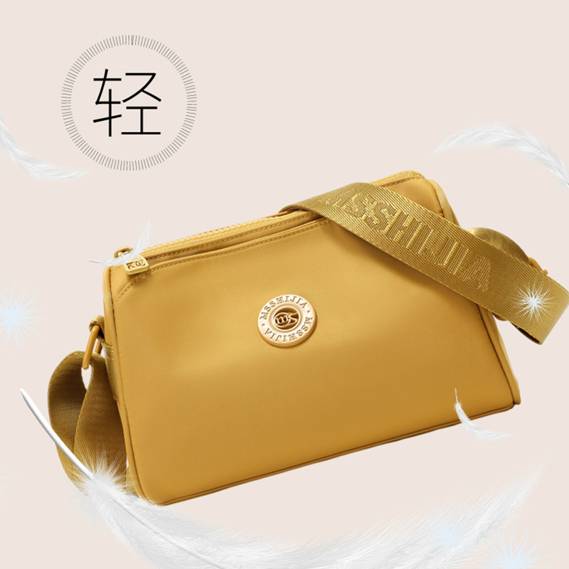 新款时尚单肩小挎包简约百搭斜挎包女士黄色轻便防水牛津布枕头包