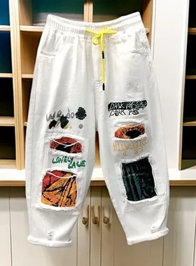 破洞松紧腰八分牛仔裤显瘦哈伦裤
