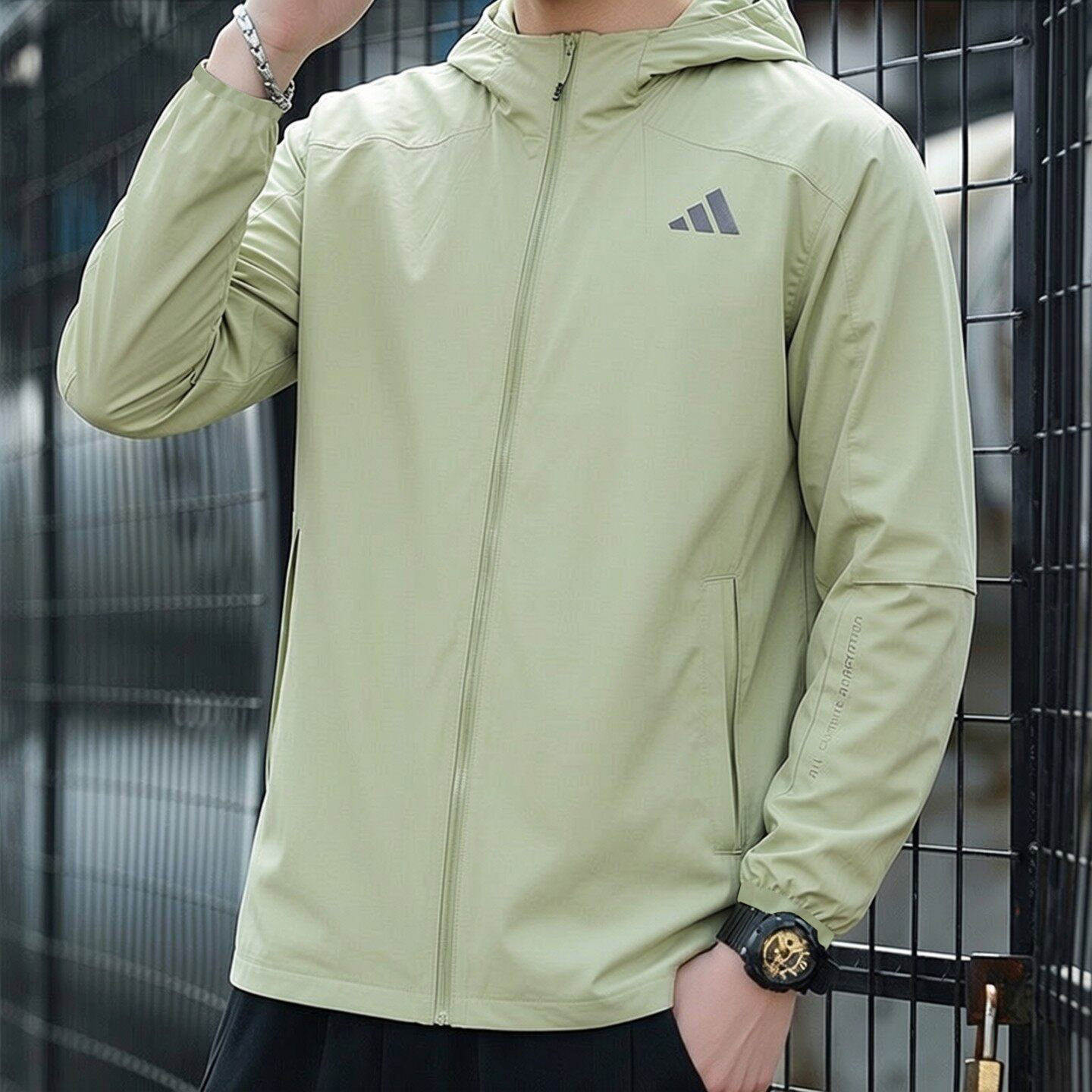 阿迪达斯绿色防风衣男春