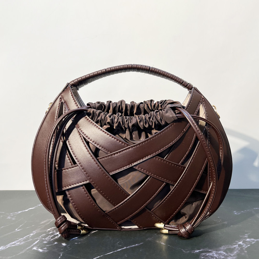 欧美复古交叉编织小众包包2026新款镂空有内袋顶部提把手提斜挎包