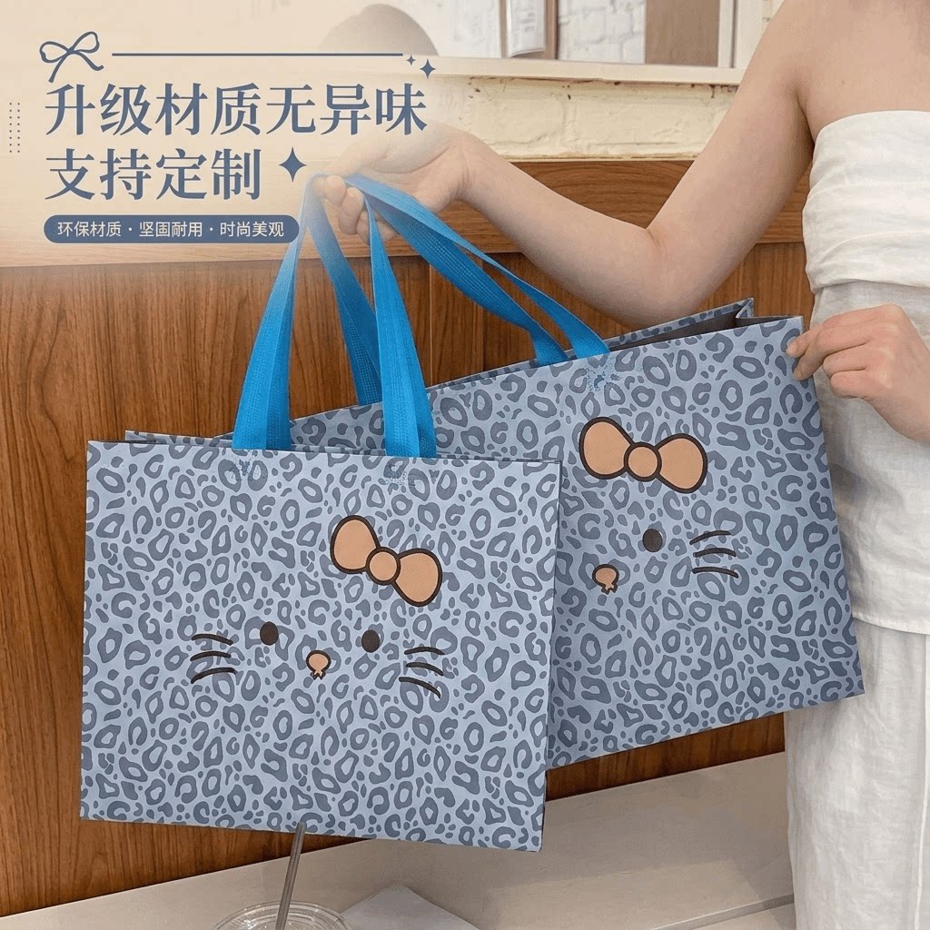 新款服装店手提袋儿童女装礼品袋蓝色kitty猫无纺布包装袋子X107