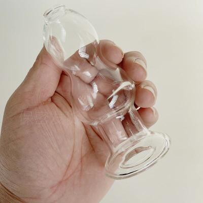 A self-pleasuring toy made of glass for use inside the anus.