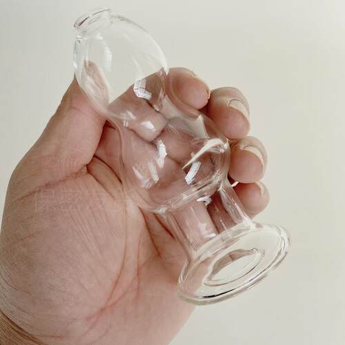 A self-pleasuring toy made of glass for use inside the anus.