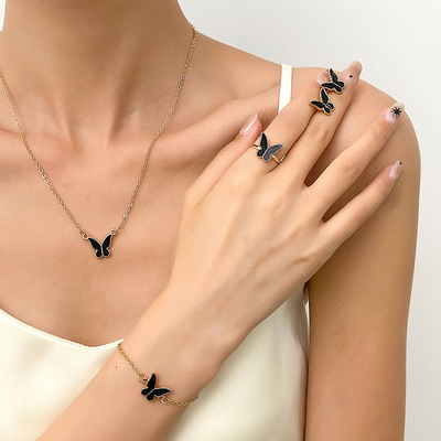 Dripping black butterfly necklace stud ring ring bracelet