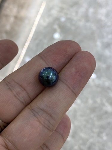 蓝色妖姬～ 正圆，孔后无暇11.7mm大溪地蓝珍珠 很贵，也很好。
