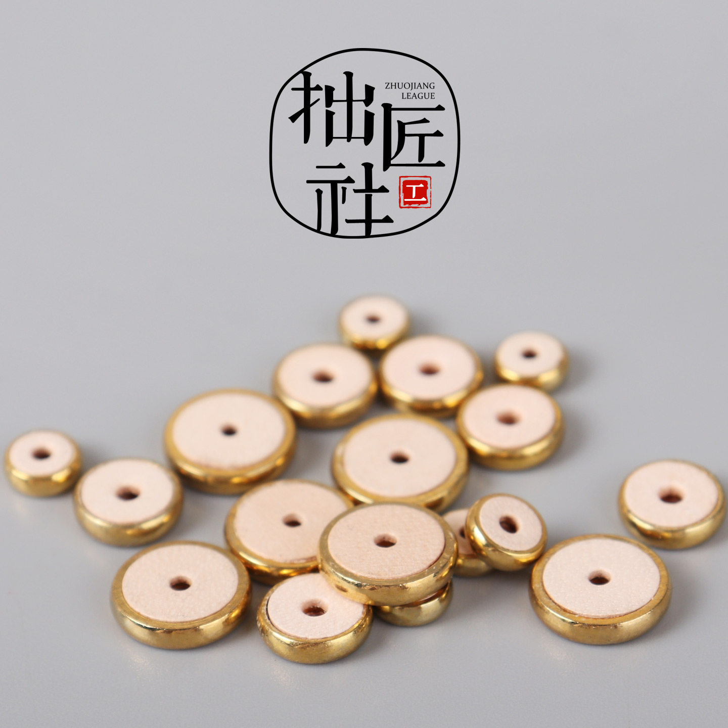 合金镀金包牛皮隔片 纯手工防磨损垫片 手串项链双面牛皮隔片图片