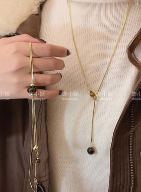 金色虎眼石抽拉毛衣链女款轻奢
